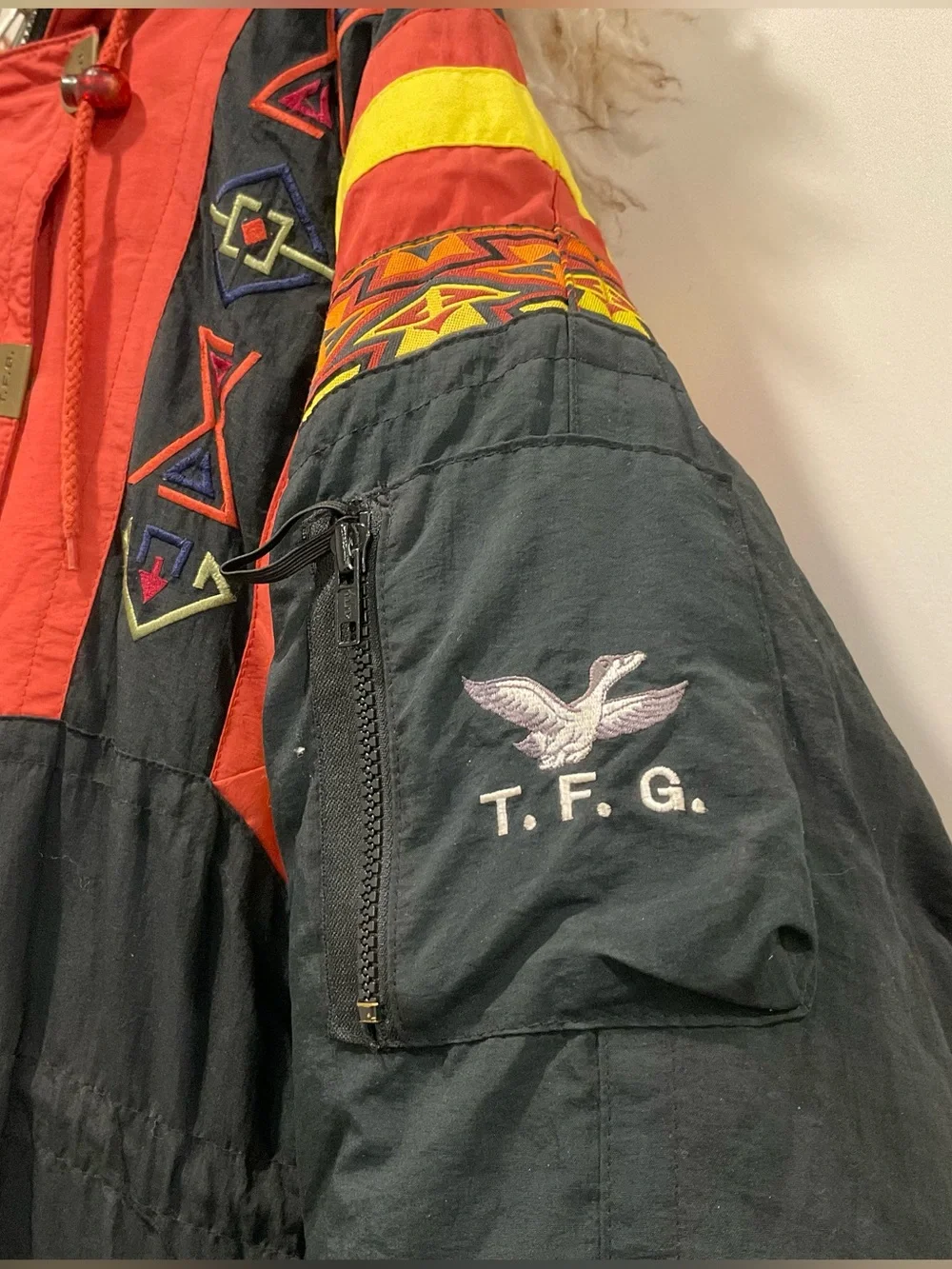 This vintage Triple F.A.T. Goose duck down ski parka features a striking.